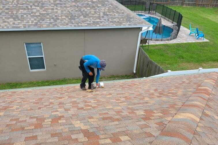 roofer doing final check of roof