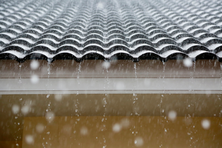 rain pouring off roof